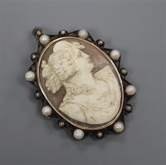 A white metal, 14ct yellow metal and cultured pearl mounted oval cameo brooch, carved with the bust of a lady to sinister, 59mm.